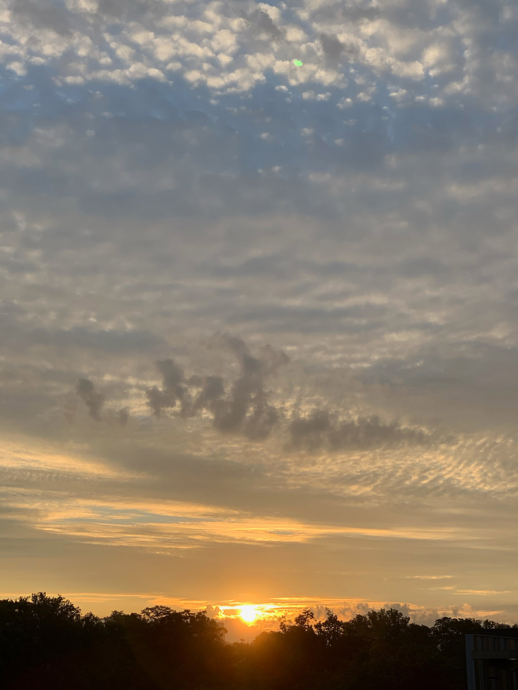 Partial Solar Eclipse viewing conditions - between the clouds at sunrise in Towson, MD! Thursday, June 10, 2021 - photo by Linda Schenk Partial Solar Eclipse viewing conditions - between the clouds at sunrise in Towson, MD! Thursday, June 10, 2021 - photo by Linda Schenk